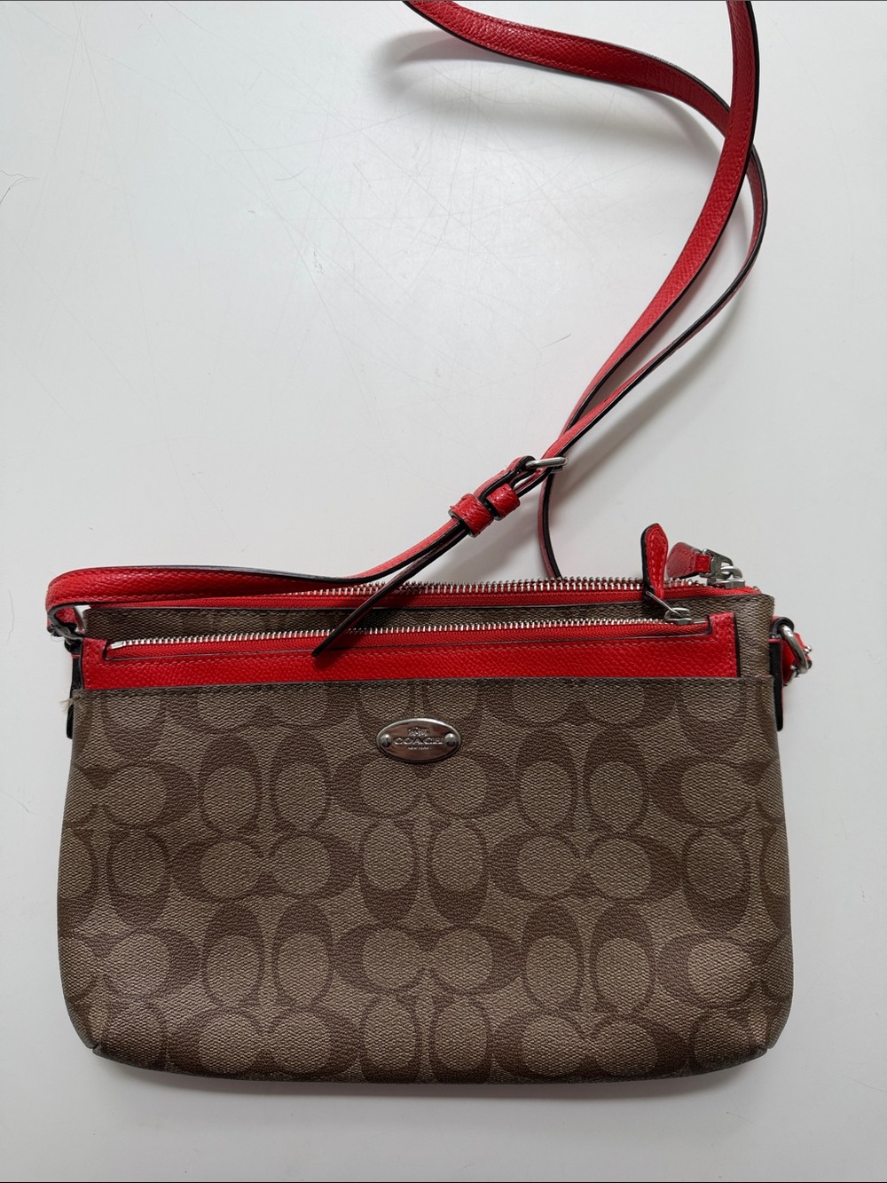 Coach Brown Signature Canvas Crossbody with orange Trim